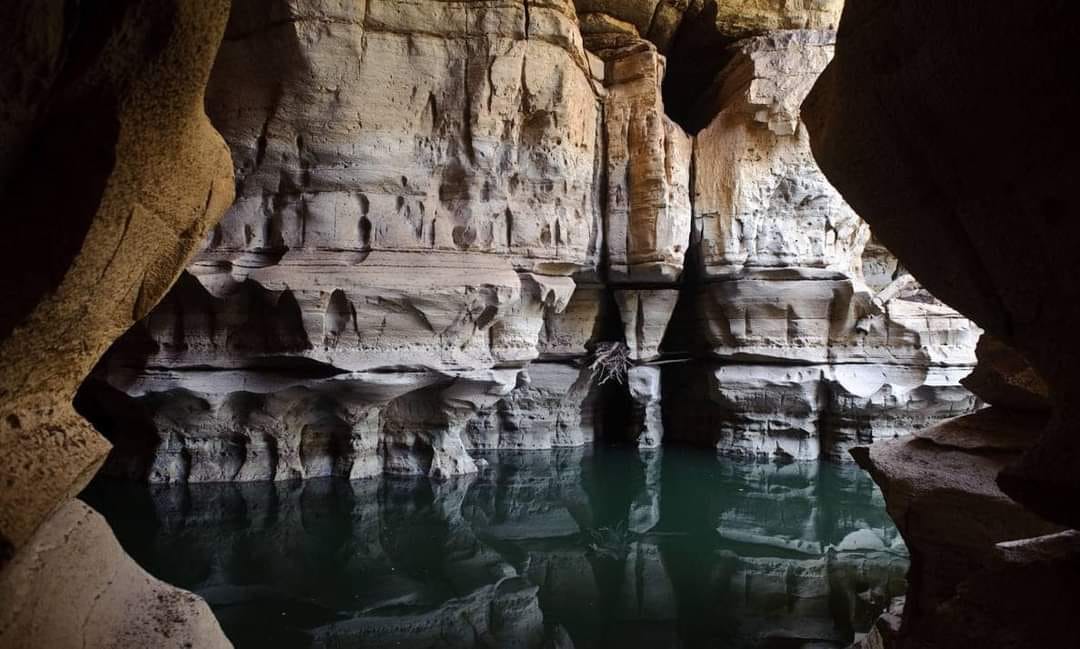 A rock pool and cave landscape in Ethiopia